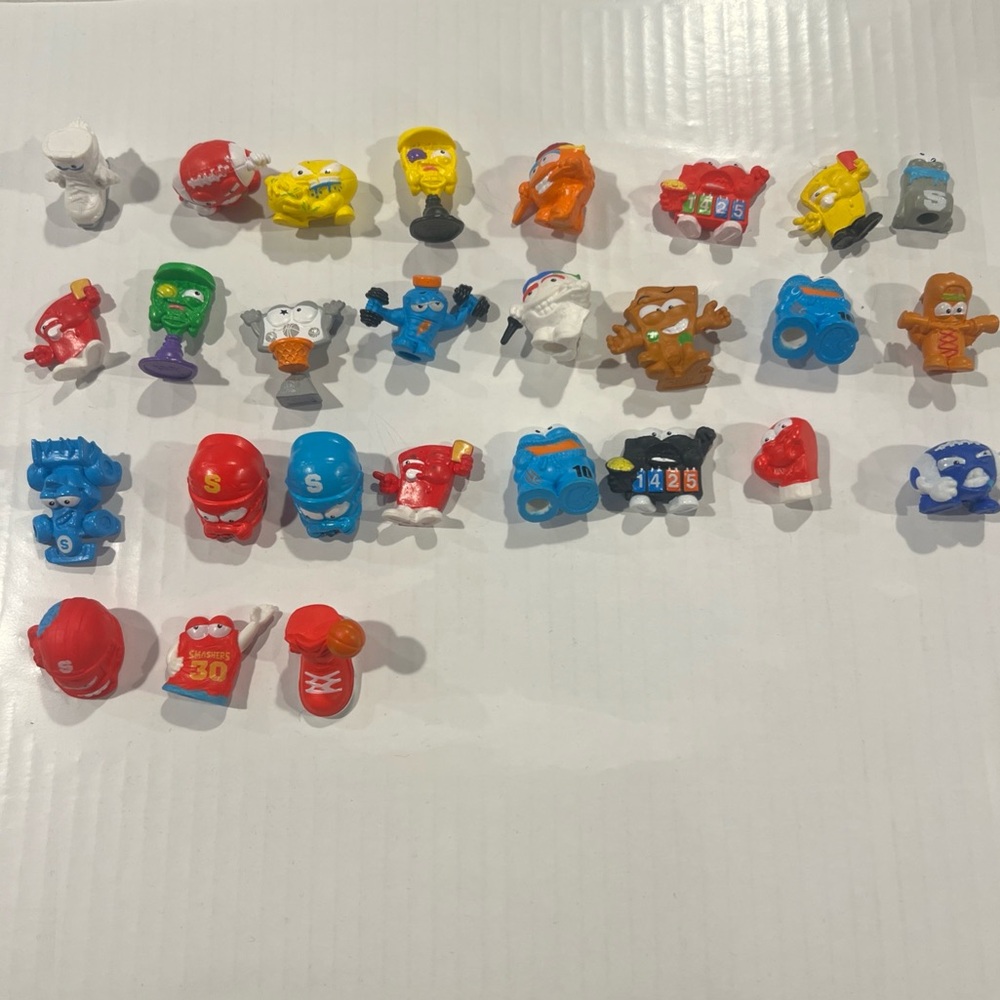 Lot Of 27 Zuru Smashers Collectible Figures
